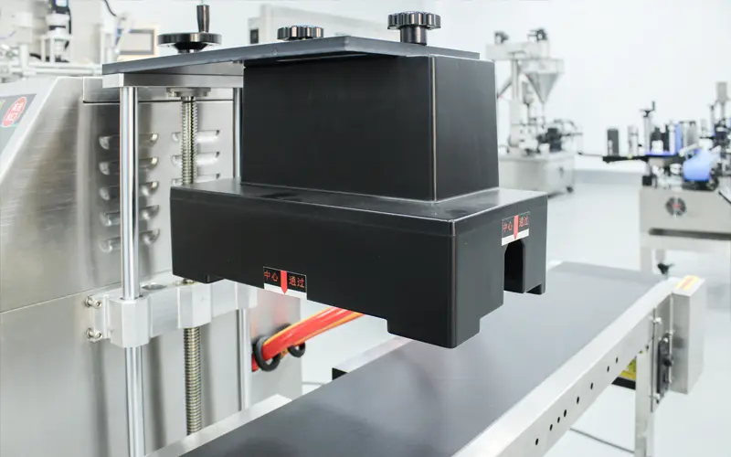 Industrial induction sealing machine for chemical containers