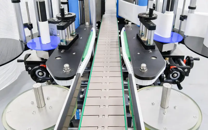 Sticker labeling machine for daily care bottles
